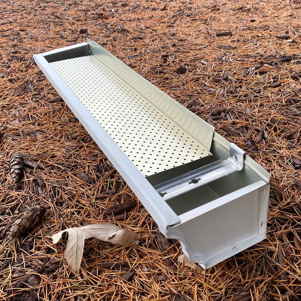 Gutter guard section on ground