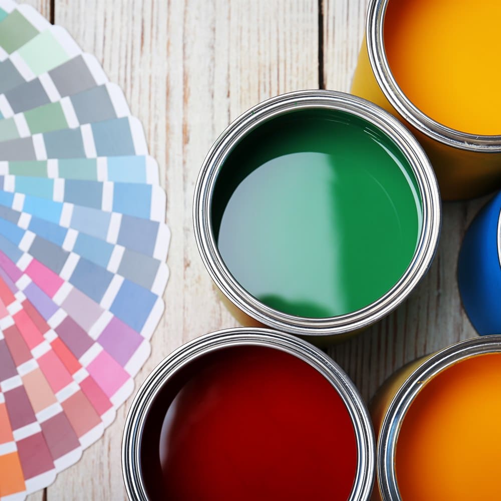 Paint cans and colour fan deck