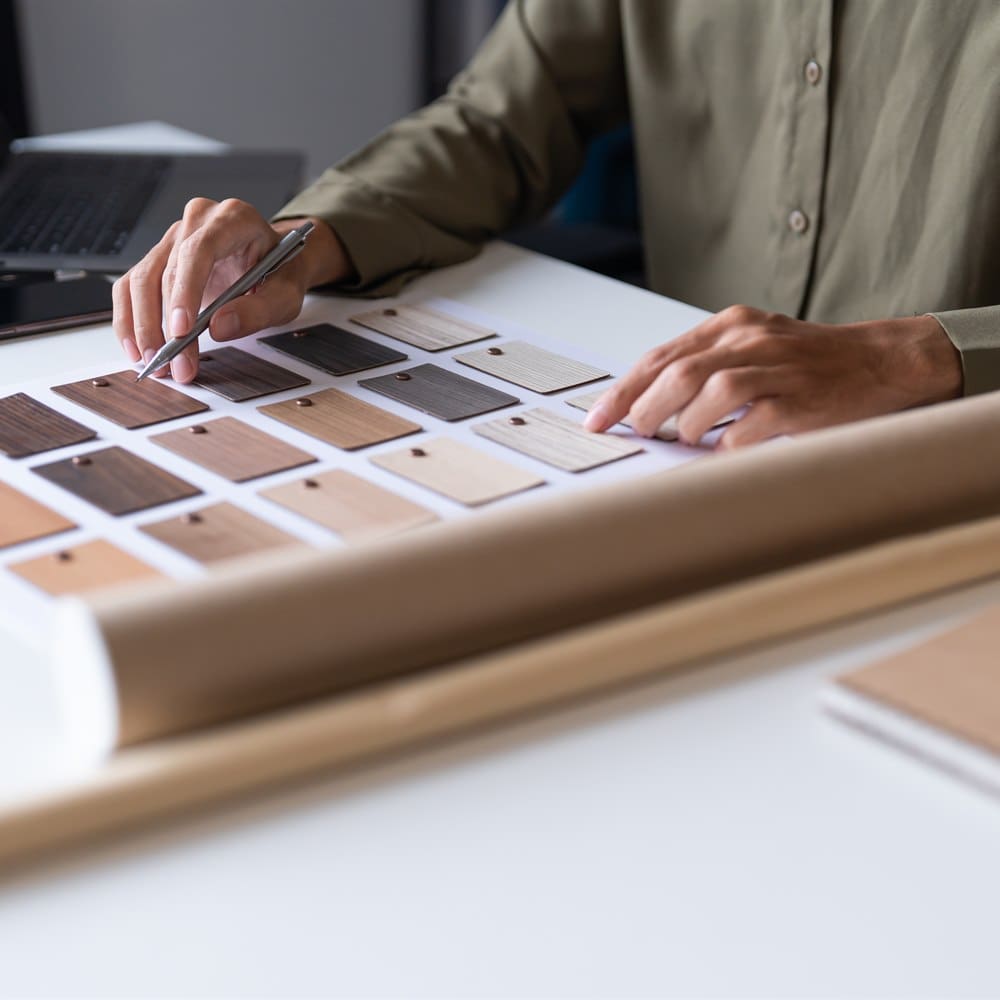 Professional selecting wood material samples