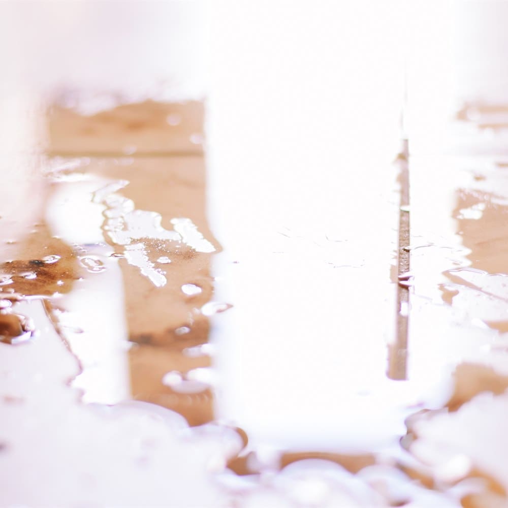 Spilled liquid creating messy abstract brown